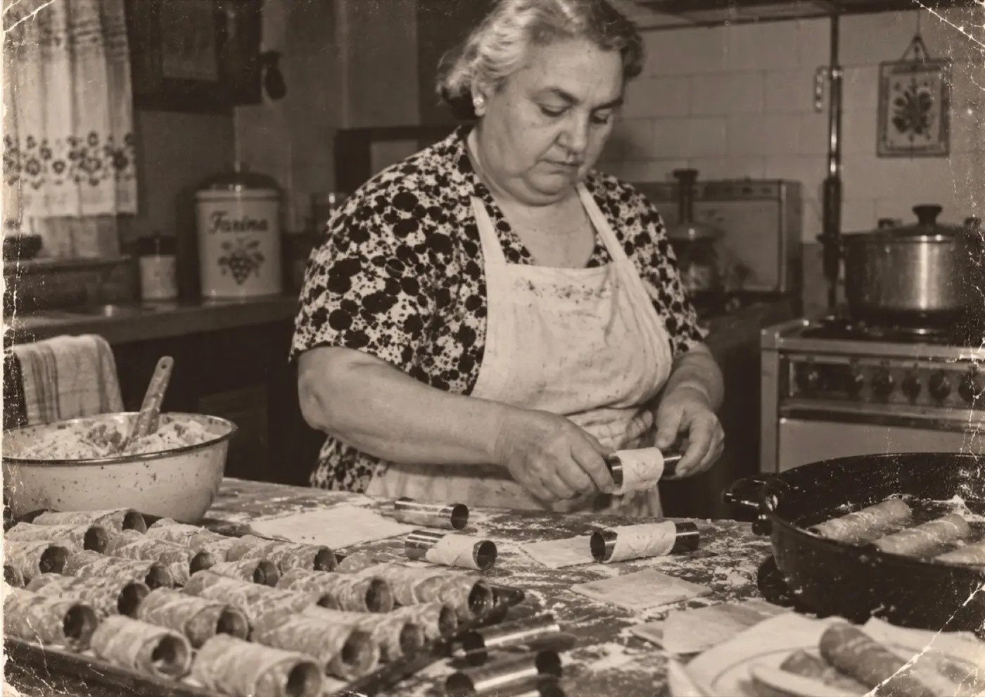 Filling cannoli by hand in the family kitchen